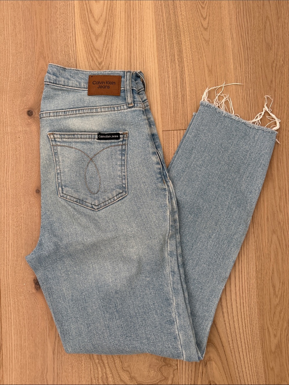 Calvin Klein Light Blue Cropped Raw-Hem Jeans